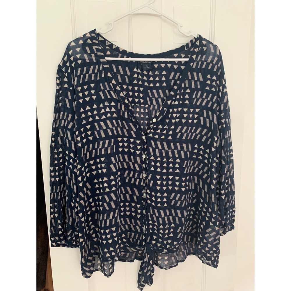 Long sleeve blue printed blouse with tie at bottom